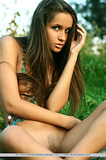 Presenting anjelika sunkissed model with athletic physique and evocative poses.