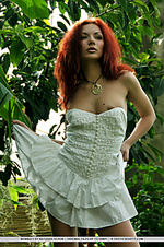 Tropic nude a redhead nymph slowly strips off her dainty dress, revealing a smooth fair complexion and gorgeous physique that stands out from the lush, green surroundings.