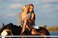 Always as one katya and mila makes a breathtaking view as they pose together with a handsome brown stallion, looking carefree and enchanting like two beautiful nymphs.