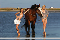 Always as one katya and mila makes a breathtaking view as they pose together with a handsome brown stallion, looking carefree and enchanting like two beautiful nymphs.