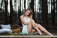 Aislin aislin performs a slow and sensual striptease in the middle of the woods