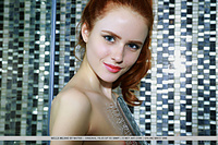 Bella milano redhead bella milano flaunts her petite, creamy body as she poses in the shower.